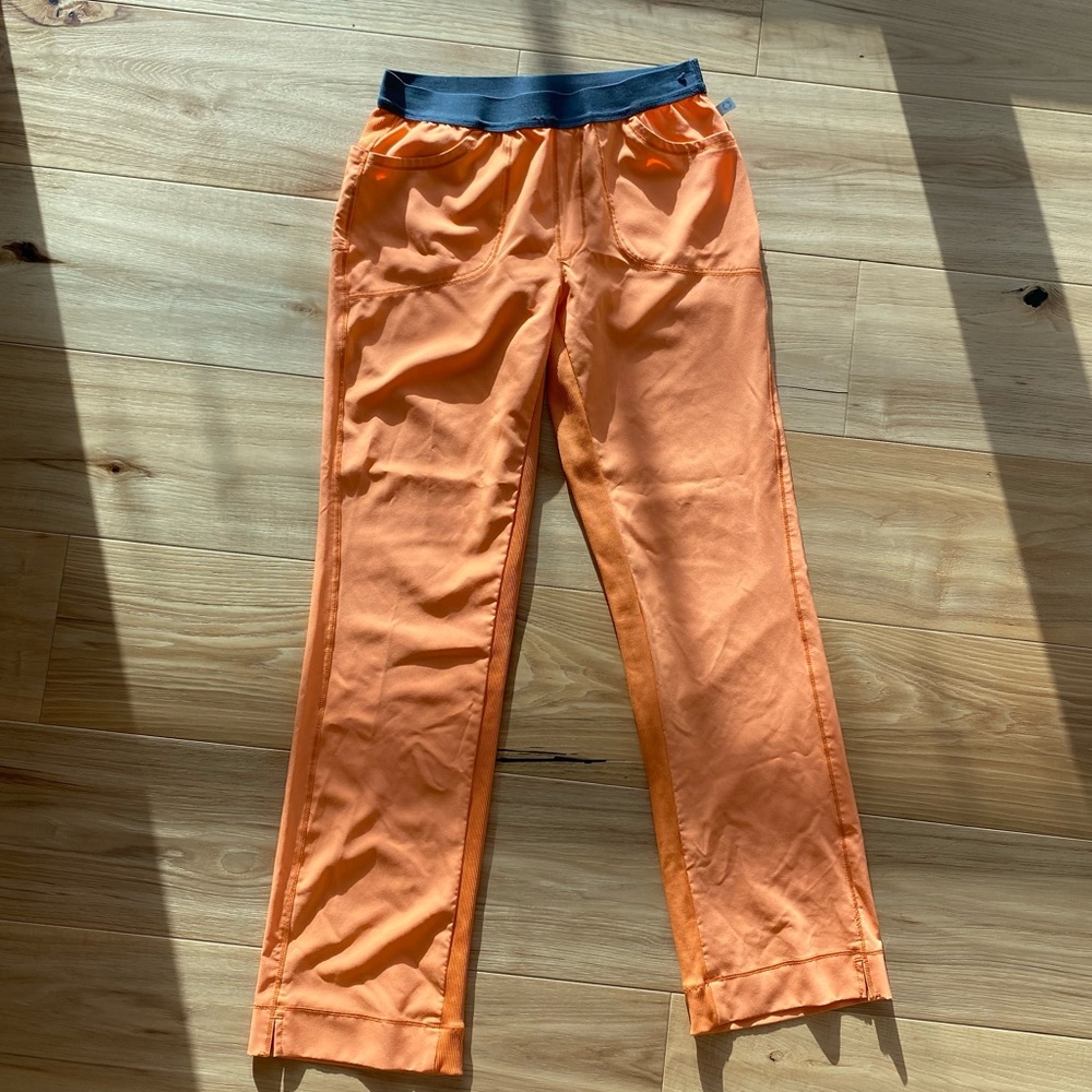 Bright orange trousers